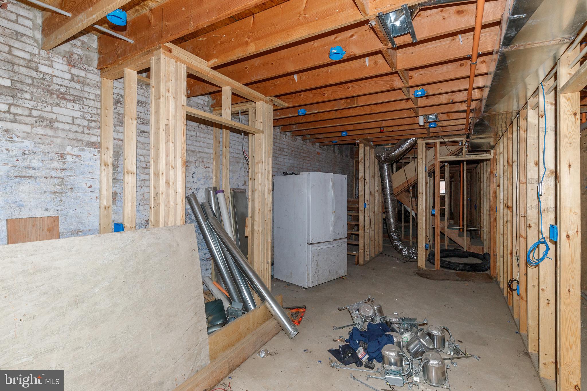 1729 Light Street Baltimore, MD 21230 - Photo 16 of 37 a view of a hallway with stairs