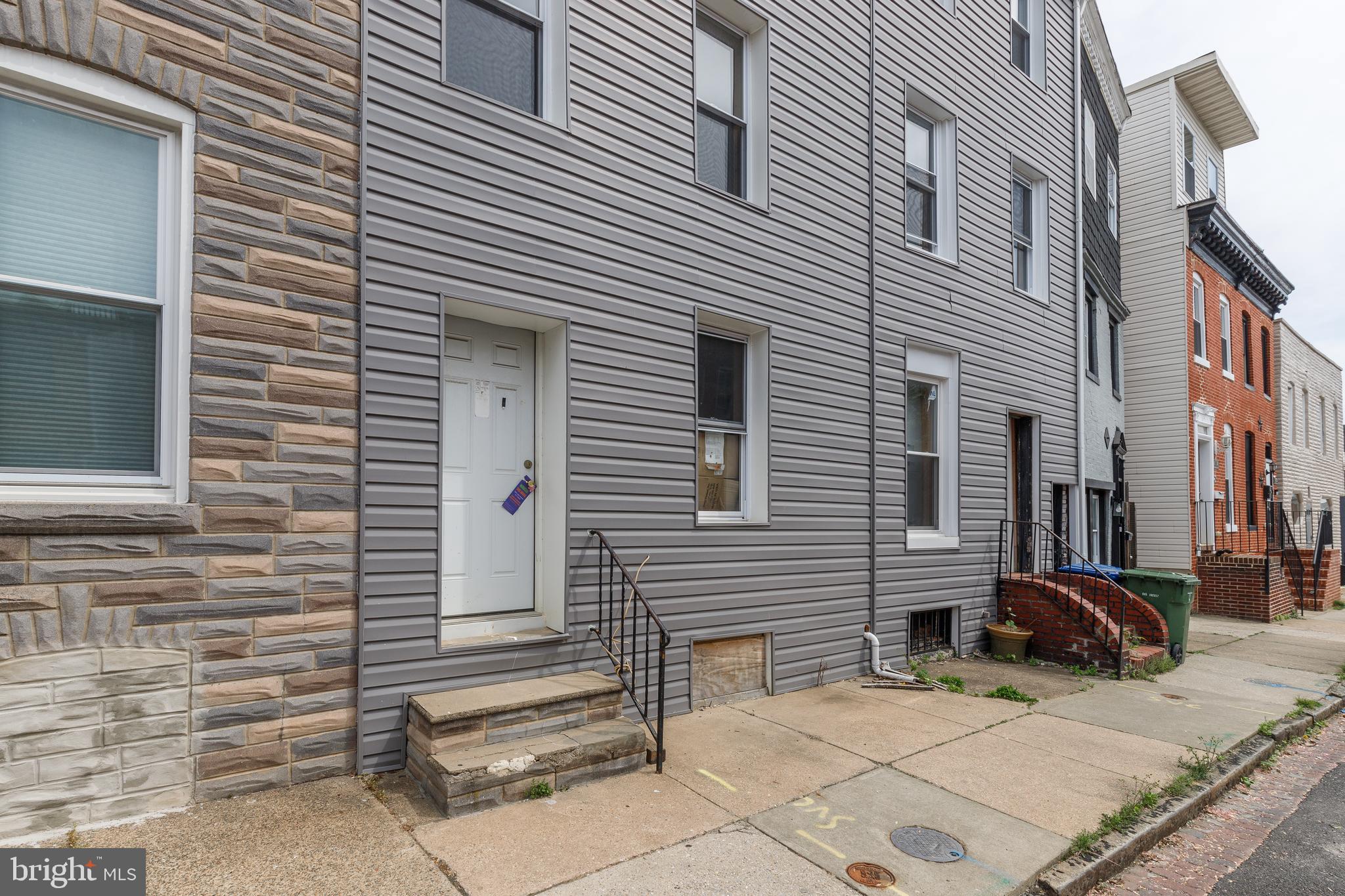 1729 Light Street Baltimore, MD 21230 - Photo 2 of 37 a view of a house with a patio