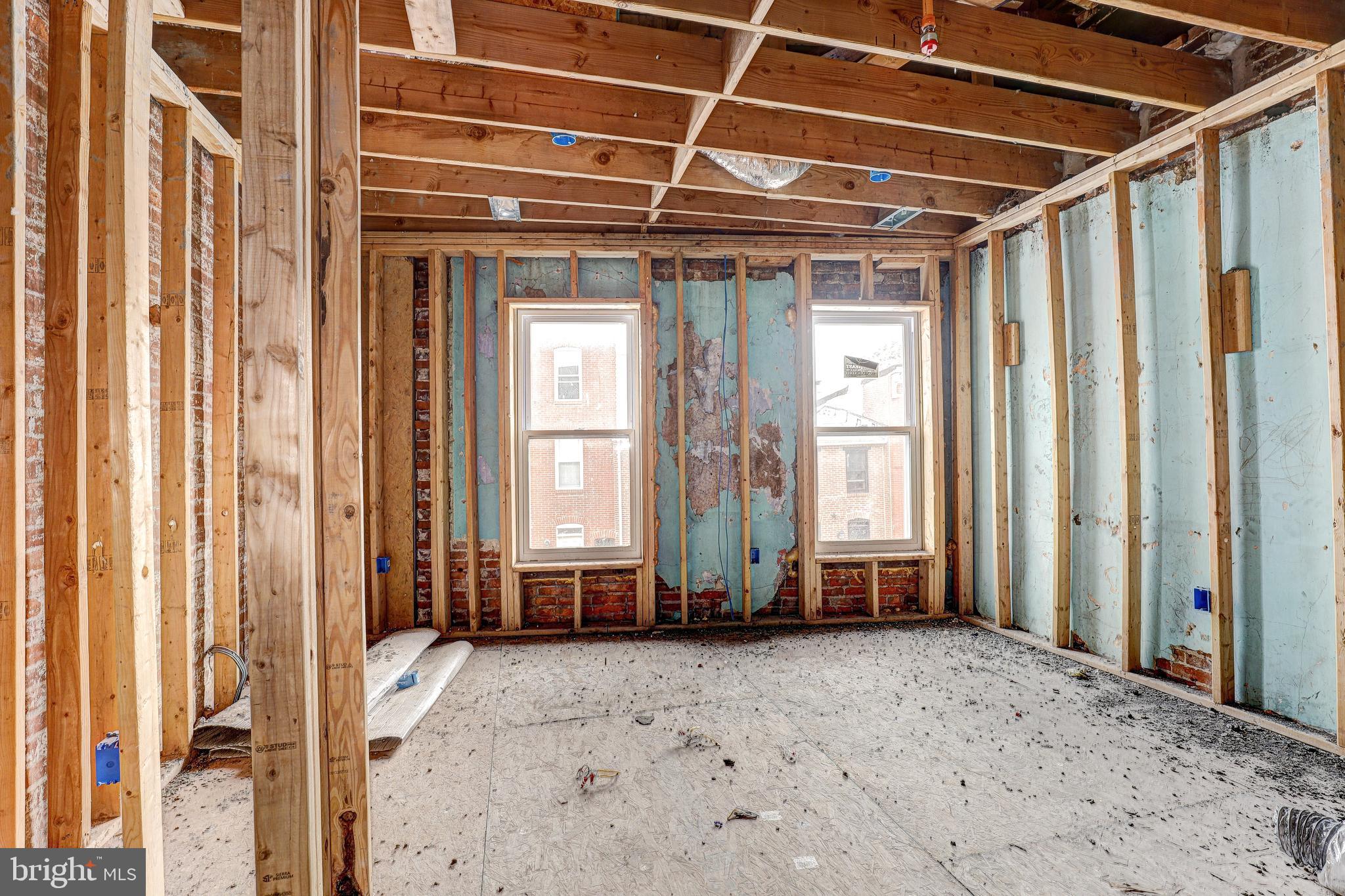 1729 Light Street Baltimore, MD 21230 - Photo 22 of 37 a view of a room with wooden walls and windows