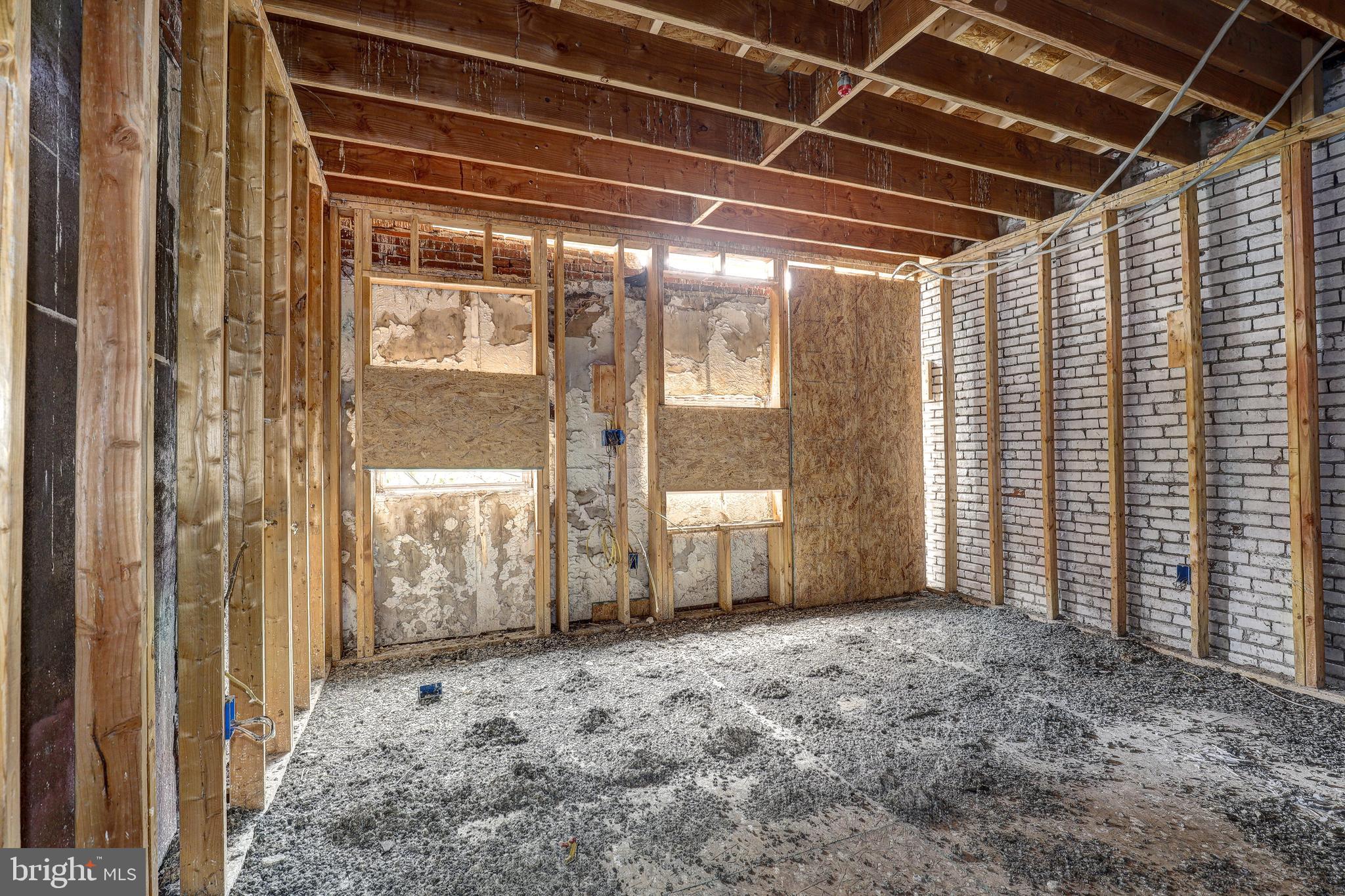 1729 Light Street Baltimore, MD 21230 - Photo 25 of 37 a view of an empty room with windows