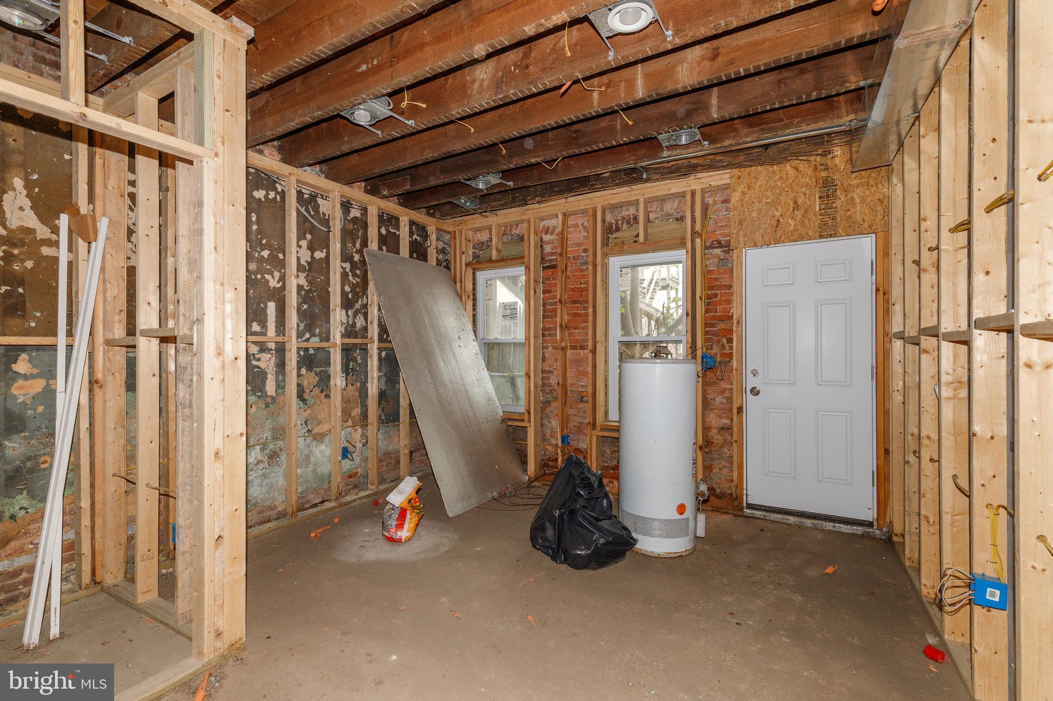 1729 Light Street Baltimore, MD 21230 - Photo 3 of 37 a view of a room with wooden floor and windows