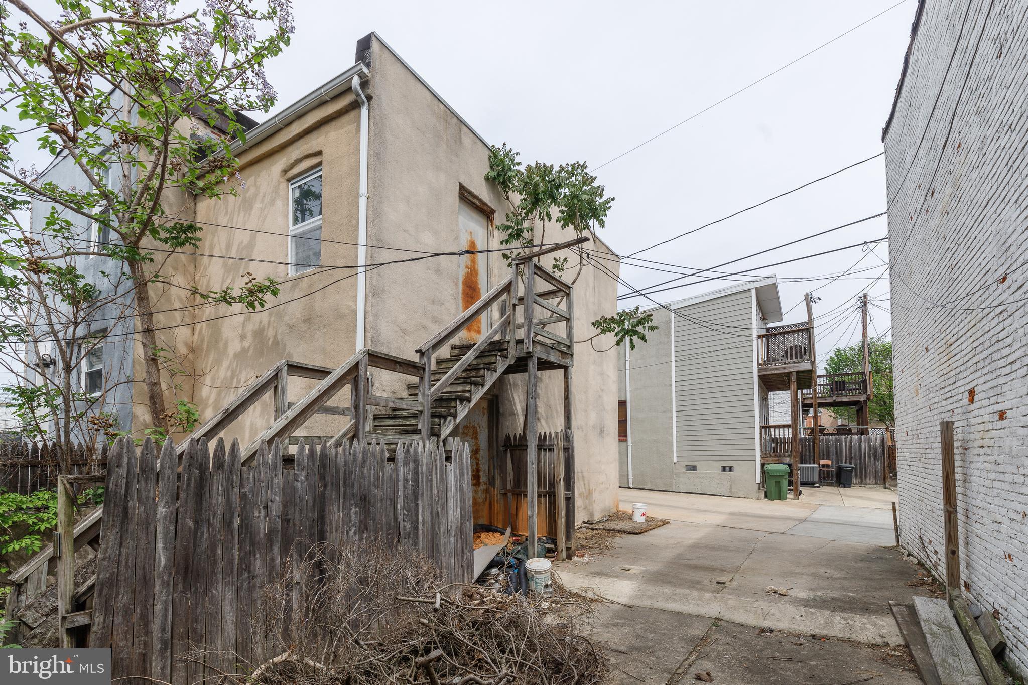1729 Light Street Baltimore, MD 21230 - Photo 37 of 37 a view of a house with a wooden fence