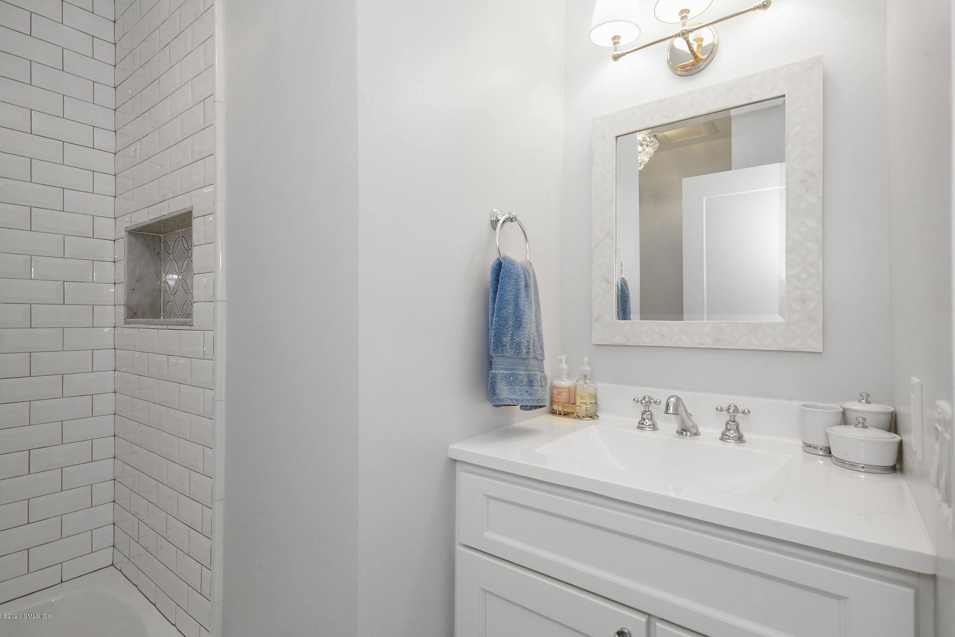 102 Valley Road, Unit 25 Cos Cob, CT 06807 - Photo 14 of 21 a bathroom with a sink and a mirror