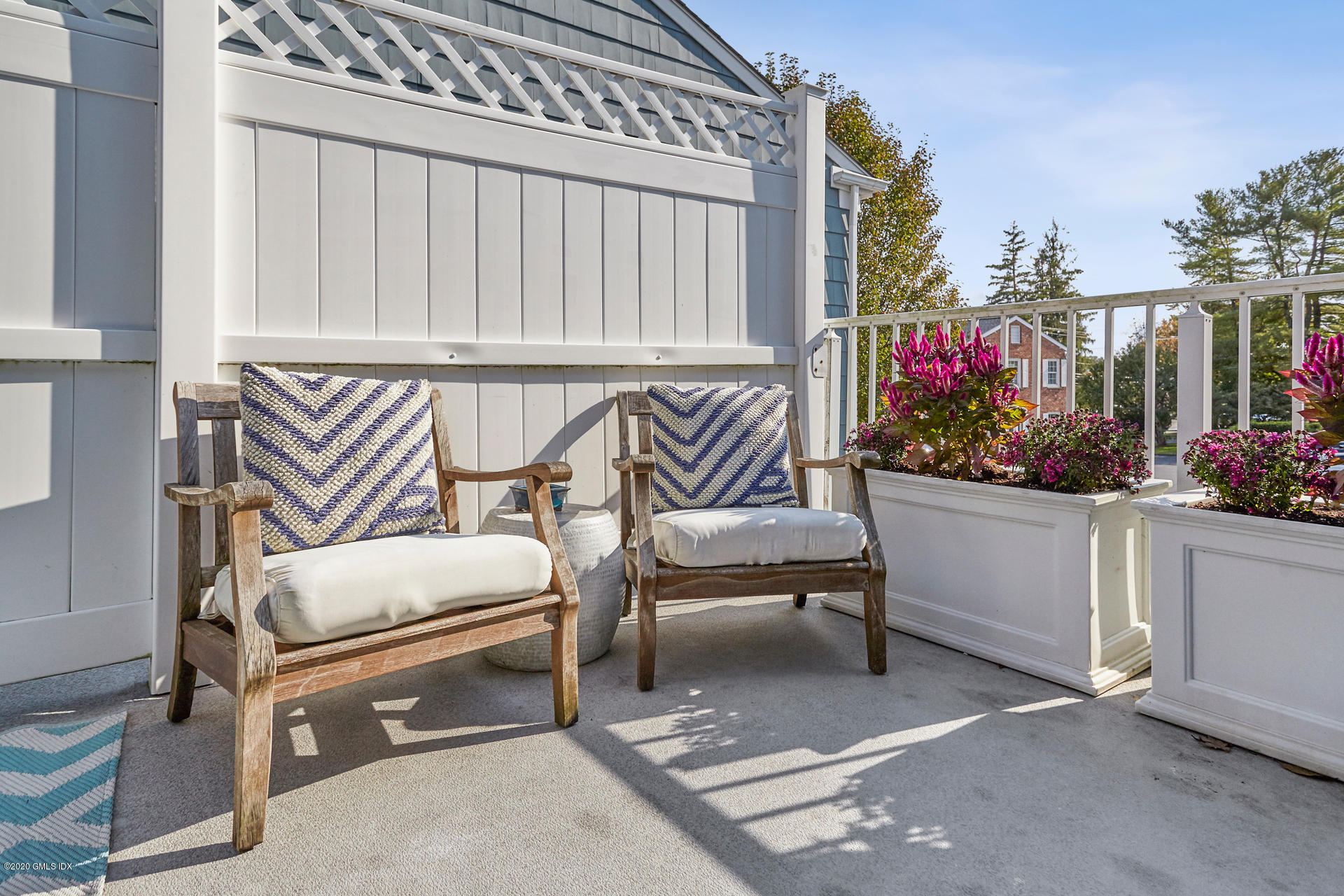 102 Valley Road, Unit 25 Cos Cob, CT 06807 - Photo 9 of 21 a outdoor living space with furniture and flowers