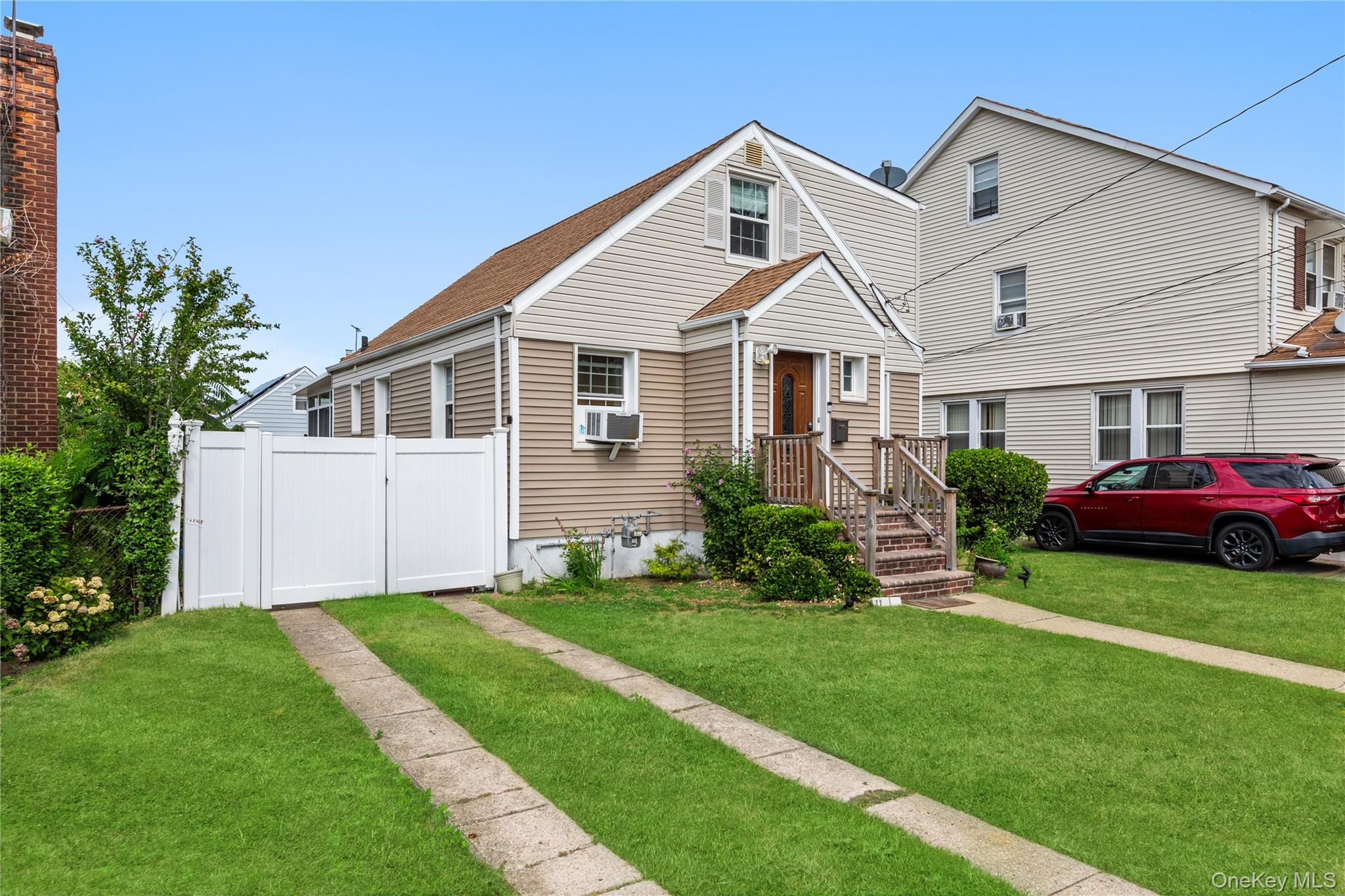 11 Dewitt Street Valley Stream, NY 11580 - Photo 2 of 21 View of front facade with roof with shingles