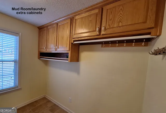 a bathroom with a double vanity sink and mirror