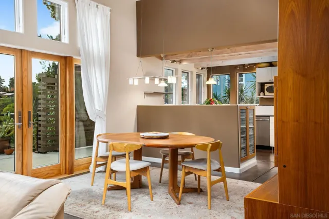 a kitchen with stainless steel appliances a refrigerator and cabinets