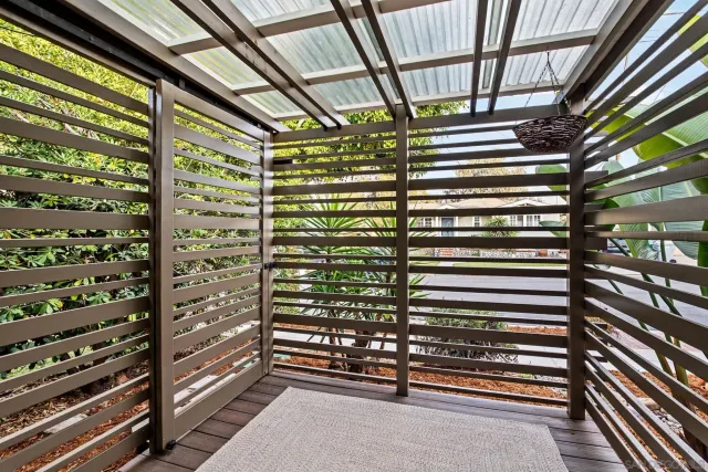 a bathroom with a sink toilet and a mirror
