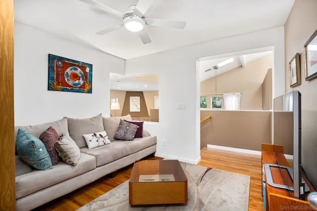 a view of room with window and furniture