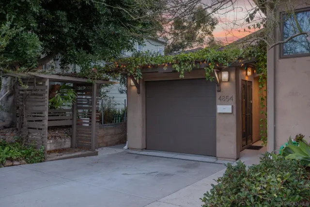 a view of backyard with sitting area