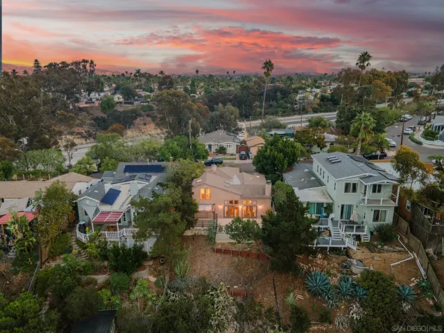 an aerial view of a city with lots of residential buildings