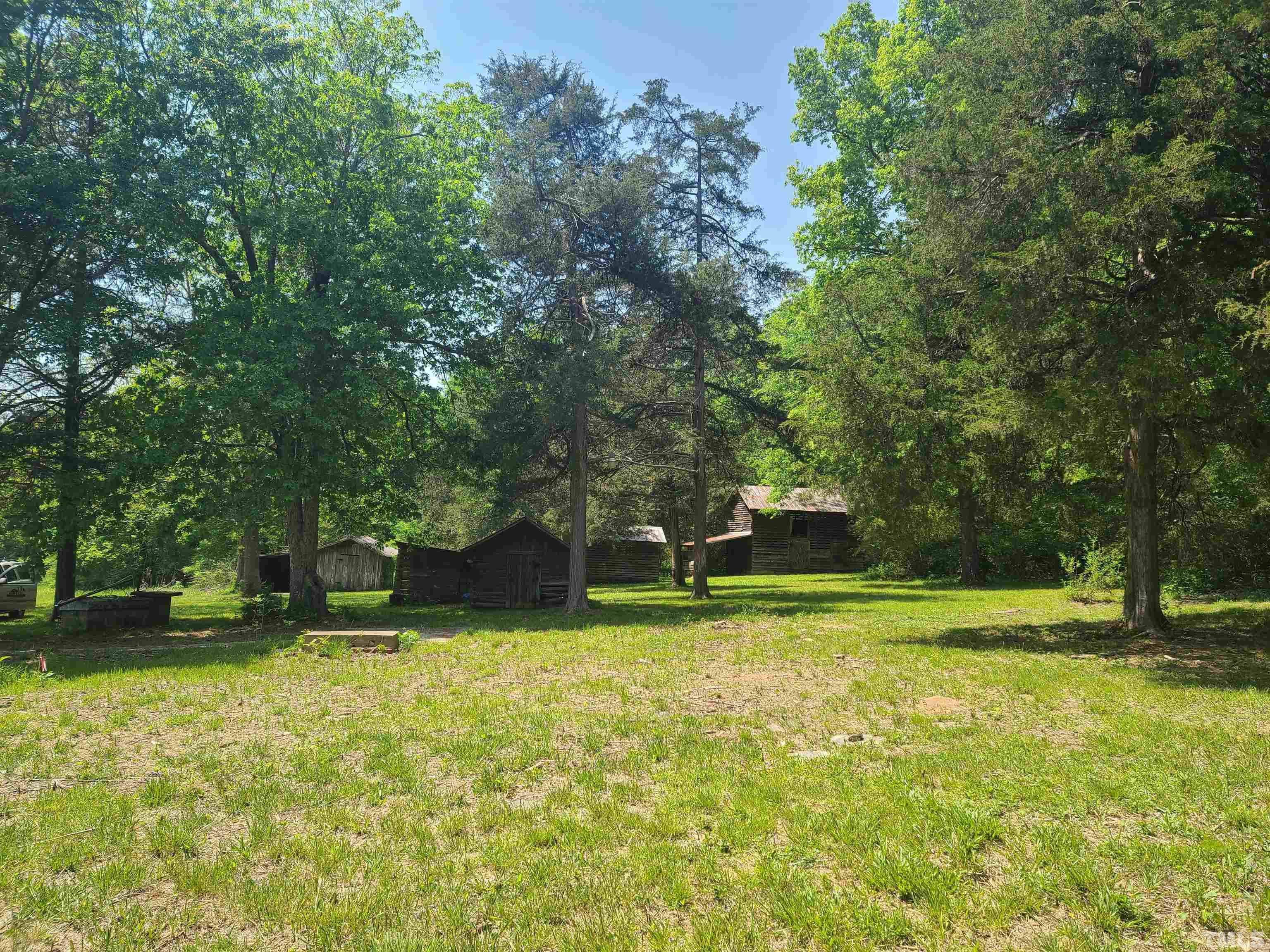 740 Bernard Purvis Road Bennett, NC 27208 - Photo 15 of 23 a view of a park with large trees