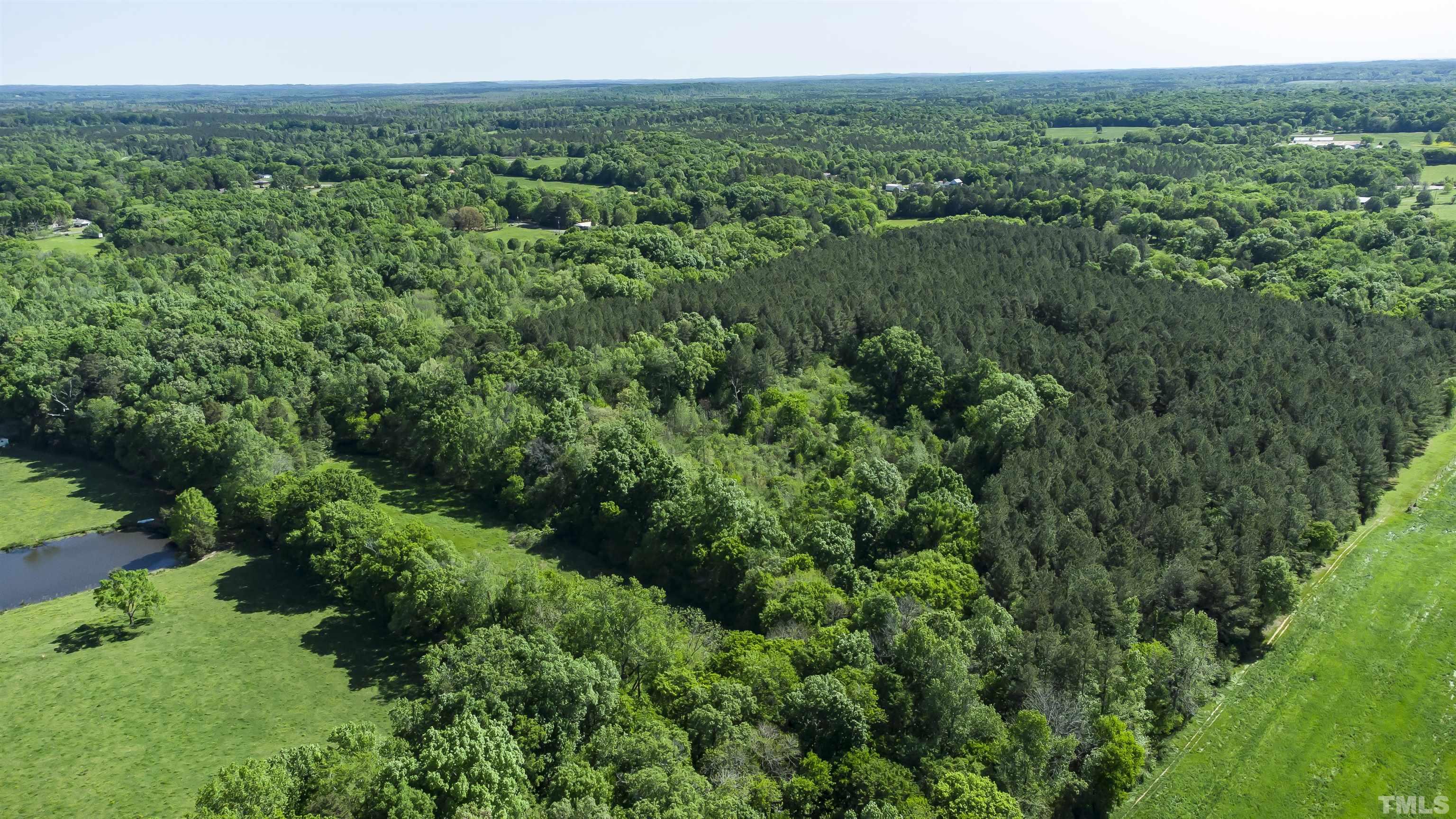 740 Bernard Purvis Road Bennett, NC 27208 - Photo 3 of 23 an aerial view of residential house with outdoor space