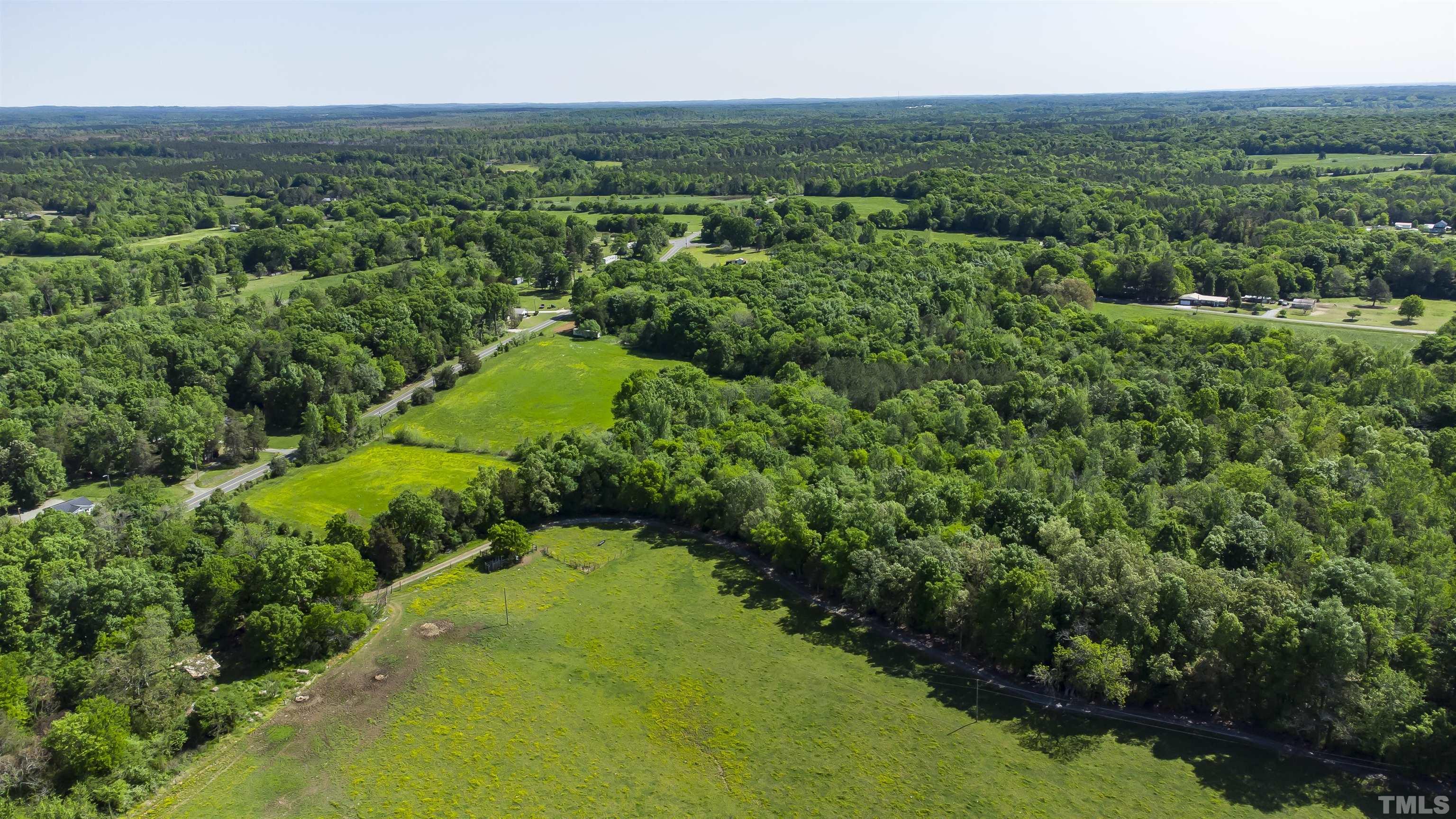 740 Bernard Purvis Road Bennett, NC 27208 - Photo 7 of 23 a view of a green yard