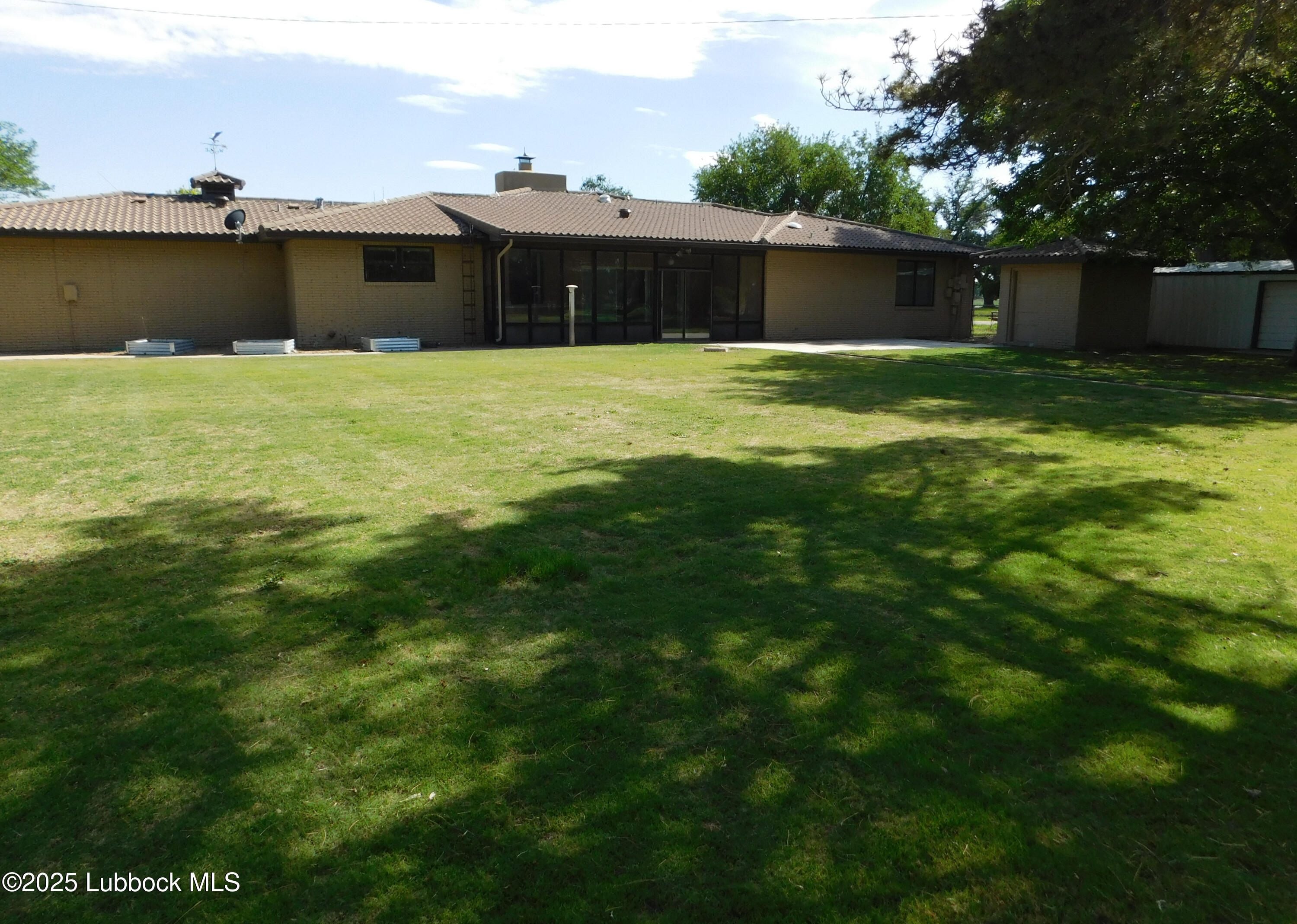 1925 Highway 70 Muleshoe, TX 79347 - Photo 45 of 49 a view of a green field with a view of houses