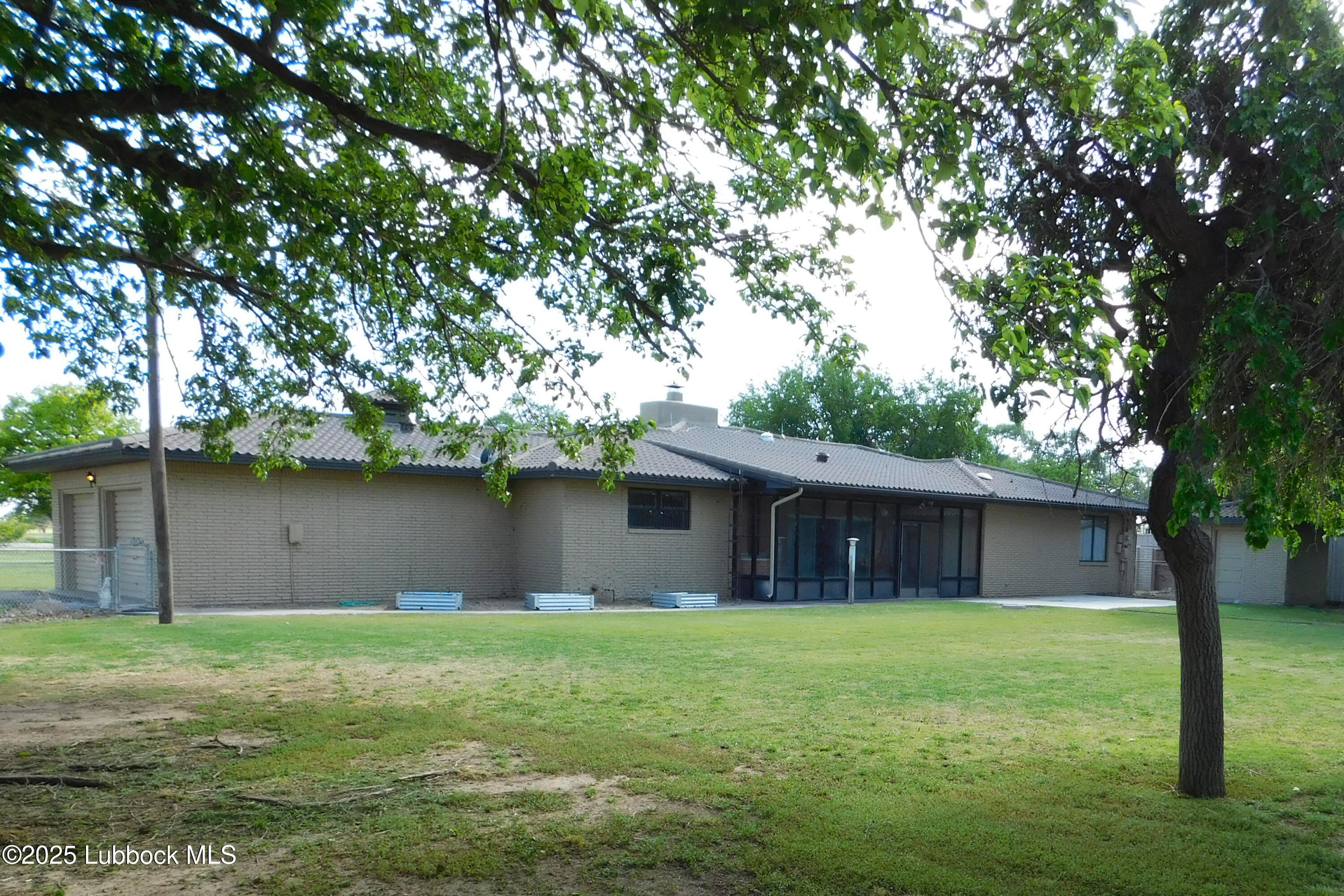 1925 Highway 70 Muleshoe, TX 79347 - Photo 46 of 49 a front view of house with garden