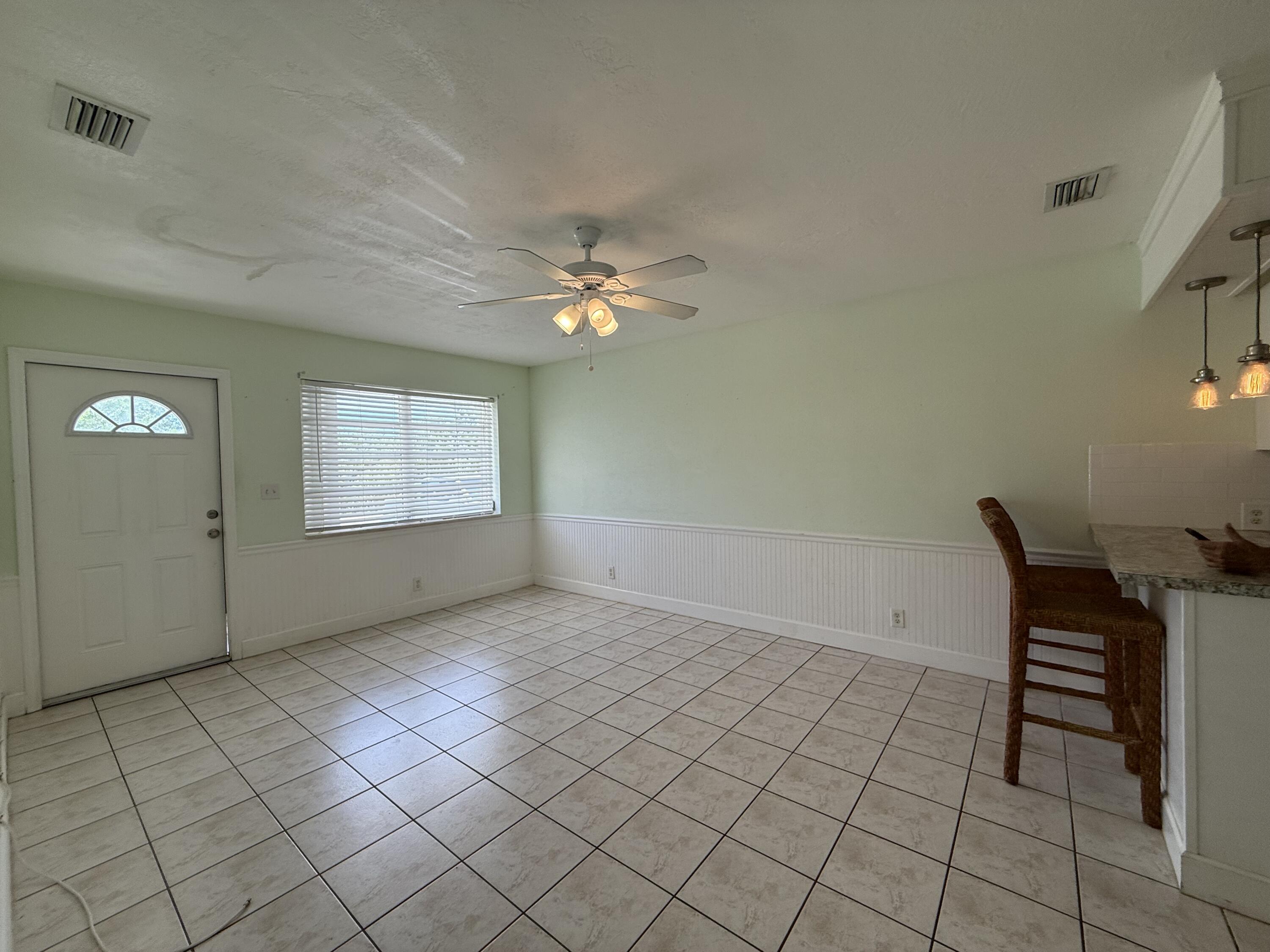 3962-3964 No Name Road Big Pine Key, FL 33043 - Photo 12 of 26 an empty room with windows