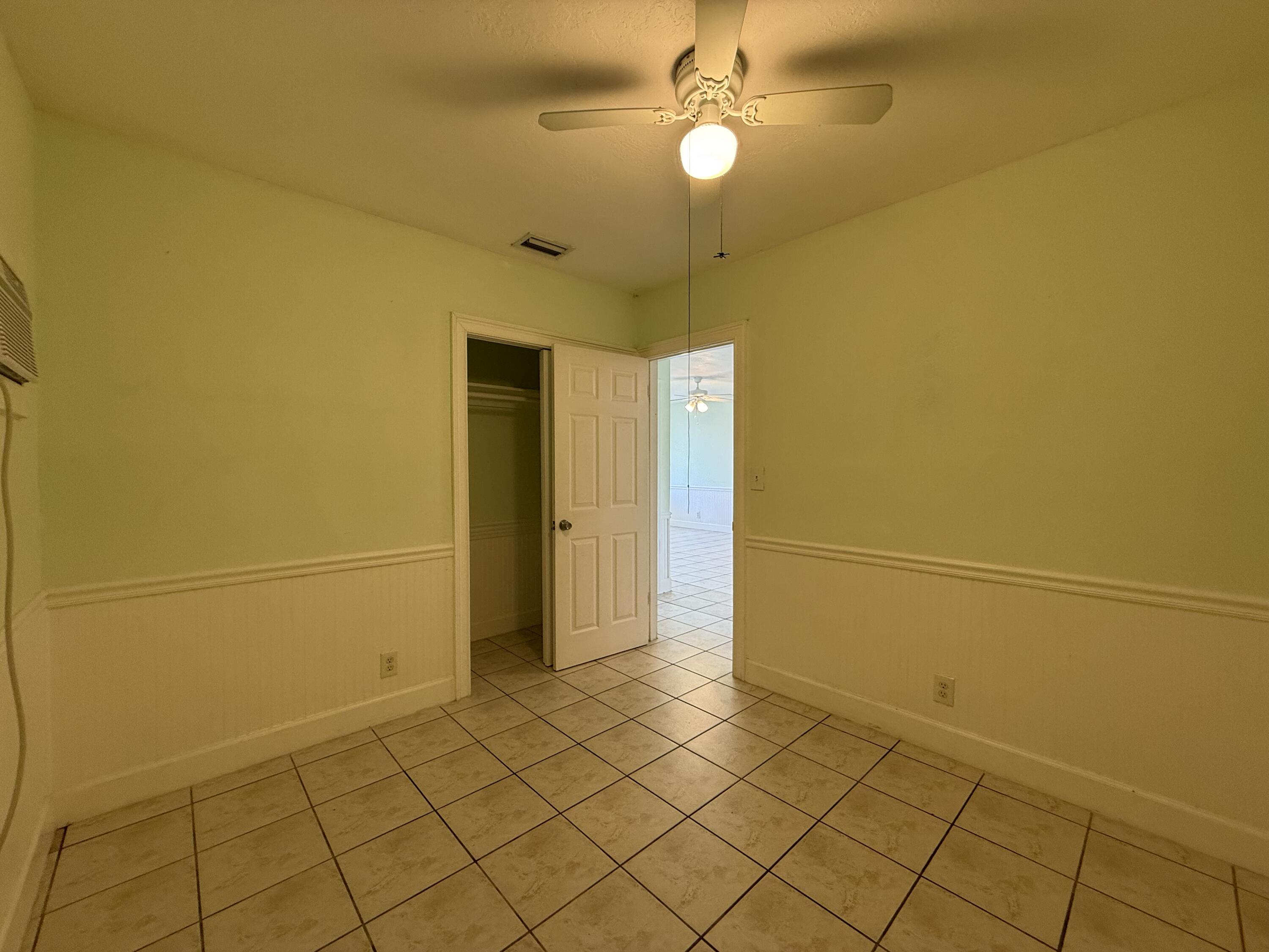 3962-3964 No Name Road Big Pine Key, FL 33043 - Photo 18 of 26 a view of a room with wooden floor