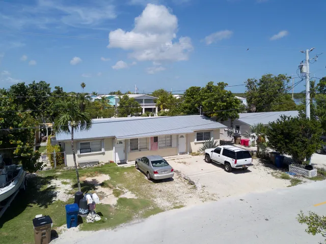 a car parked in front of a house