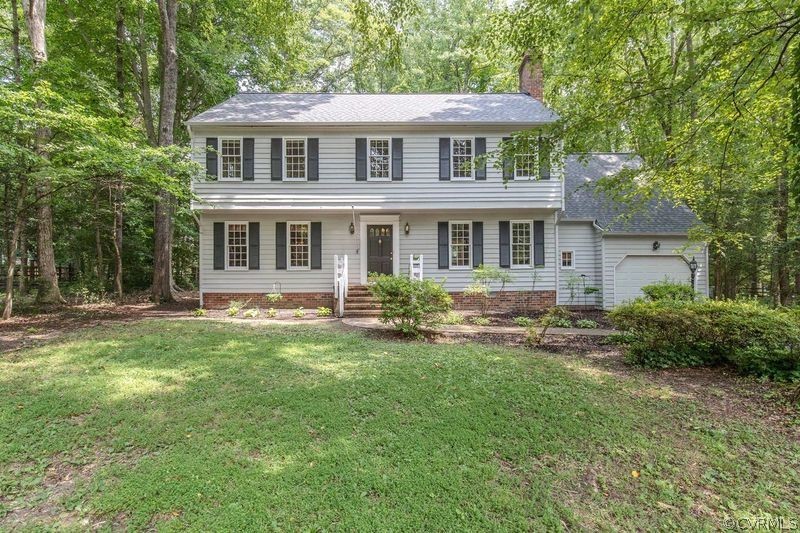 13603 Timber Ridge Court Midlothian, VA 23112 - Photo 1 of 29 a front view of a house with a yard