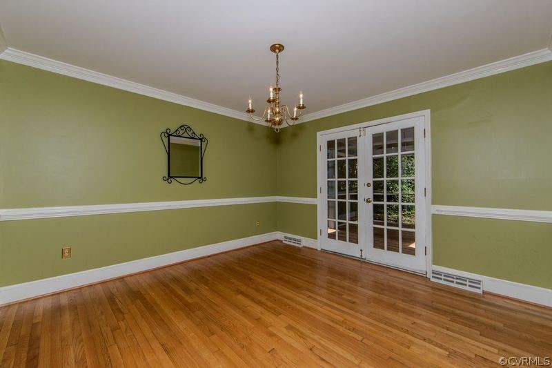13603 Timber Ridge Court Midlothian, VA 23112 - Photo 12 of 29 a view of a room with wooden floor and windows