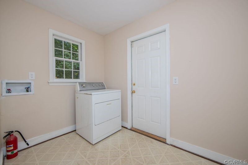 13603 Timber Ridge Court Midlothian, VA 23112 - Photo 15 of 29 a room with a window and a kitchen view