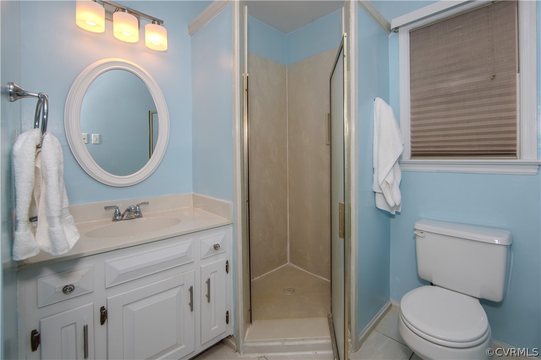 13603 Timber Ridge Court Midlothian, VA 23112 - Photo 19 of 29 a bathroom with a granite countertop toilet sink and mirror