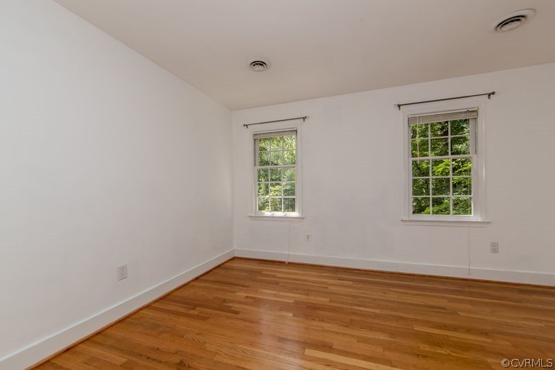 13603 Timber Ridge Court Midlothian, VA 23112 - Photo 26 of 29 wooden floor in an empty room with a window