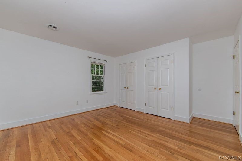 13603 Timber Ridge Court Midlothian, VA 23112 - Photo 27 of 29 a view of empty room with wooden floor and fan