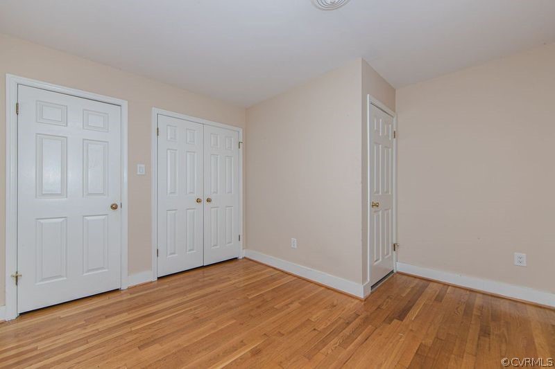 13603 Timber Ridge Court Midlothian, VA 23112 - Photo 28 of 29 a view of an empty room with wooden floor