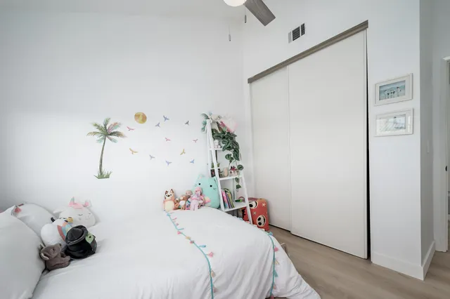 a bathroom with a sink vanity and a mirror