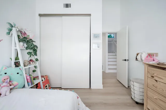 a bathroom with a sink vanity and a mirror