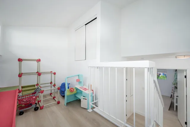 an aerial view of residential house and green space
