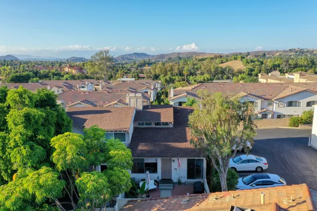 a house view with a backyard space