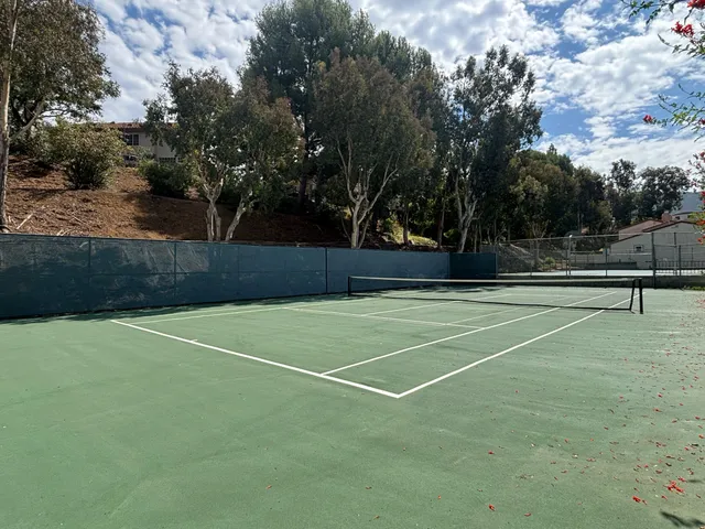 view of living room with furniture and flowers