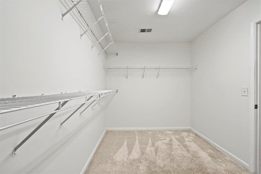 1218 Morgans Run Monroe, GA 30656 - Photo 18 of 39 a view of an empty walk in closet