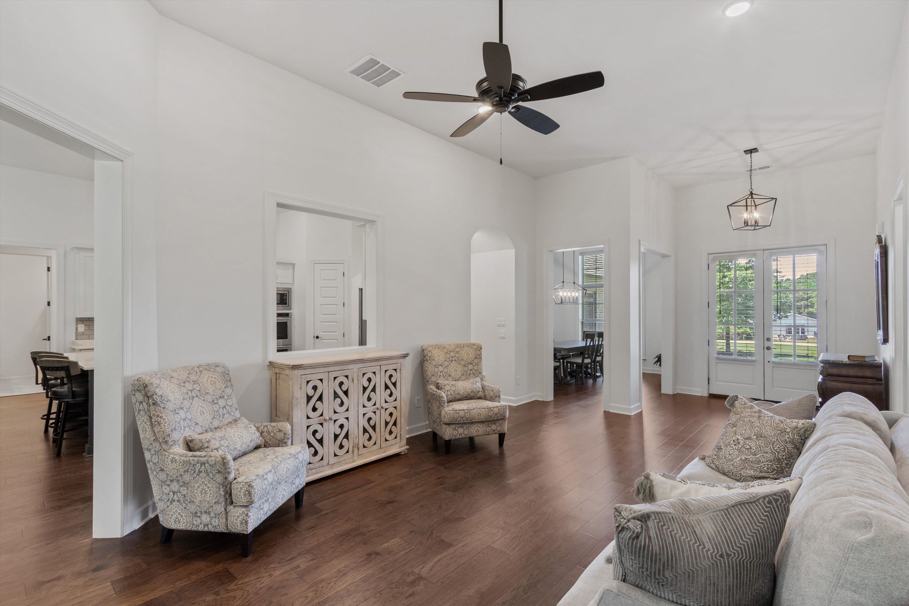 65 Watson Road Oakland, TN 38060 - Photo 8 of 40 a living room with furniture and a large window
