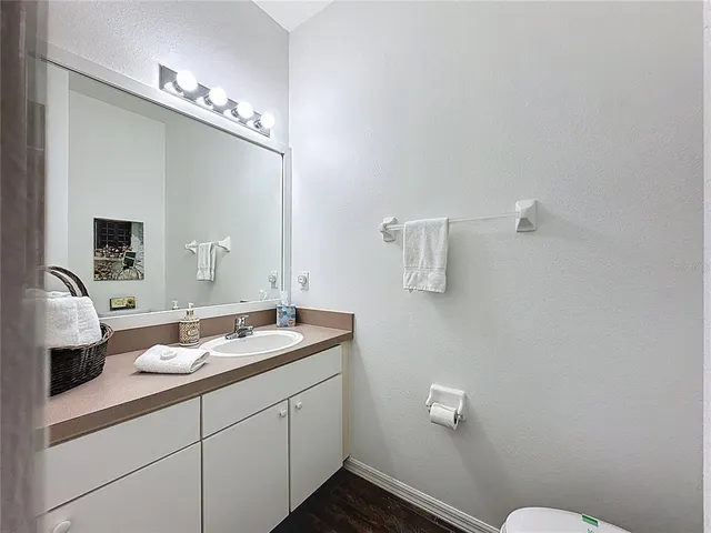 a house view with a seating space and garden