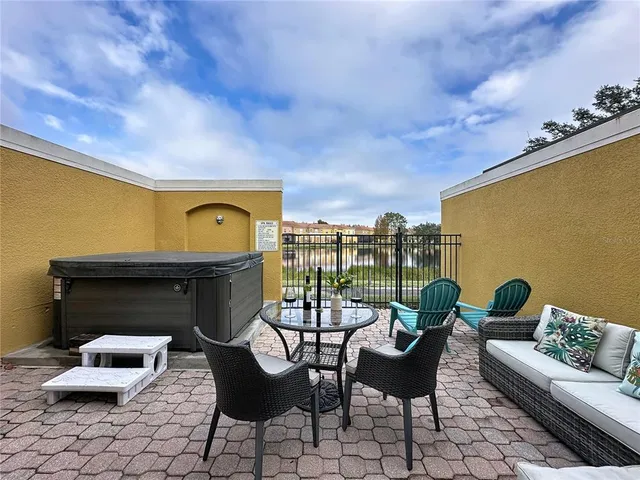 a view of a terrace with furniture