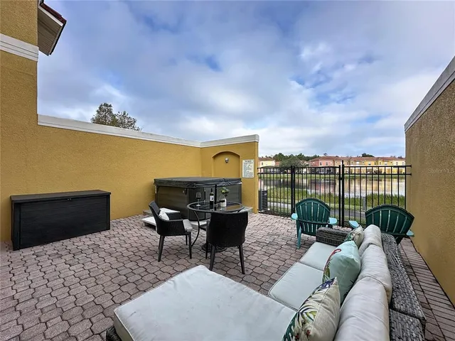 a front view of a house with seating space