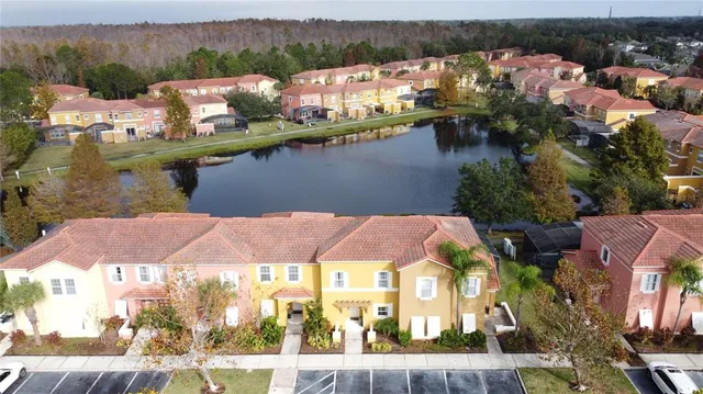 an aerial view of a swimming pool patio and mountain view