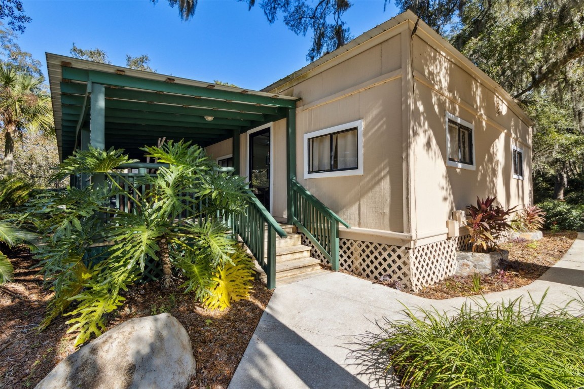 850310 Us Highway Yulee, FL 32097 - Photo 4 of 13 a view of a house with a yard