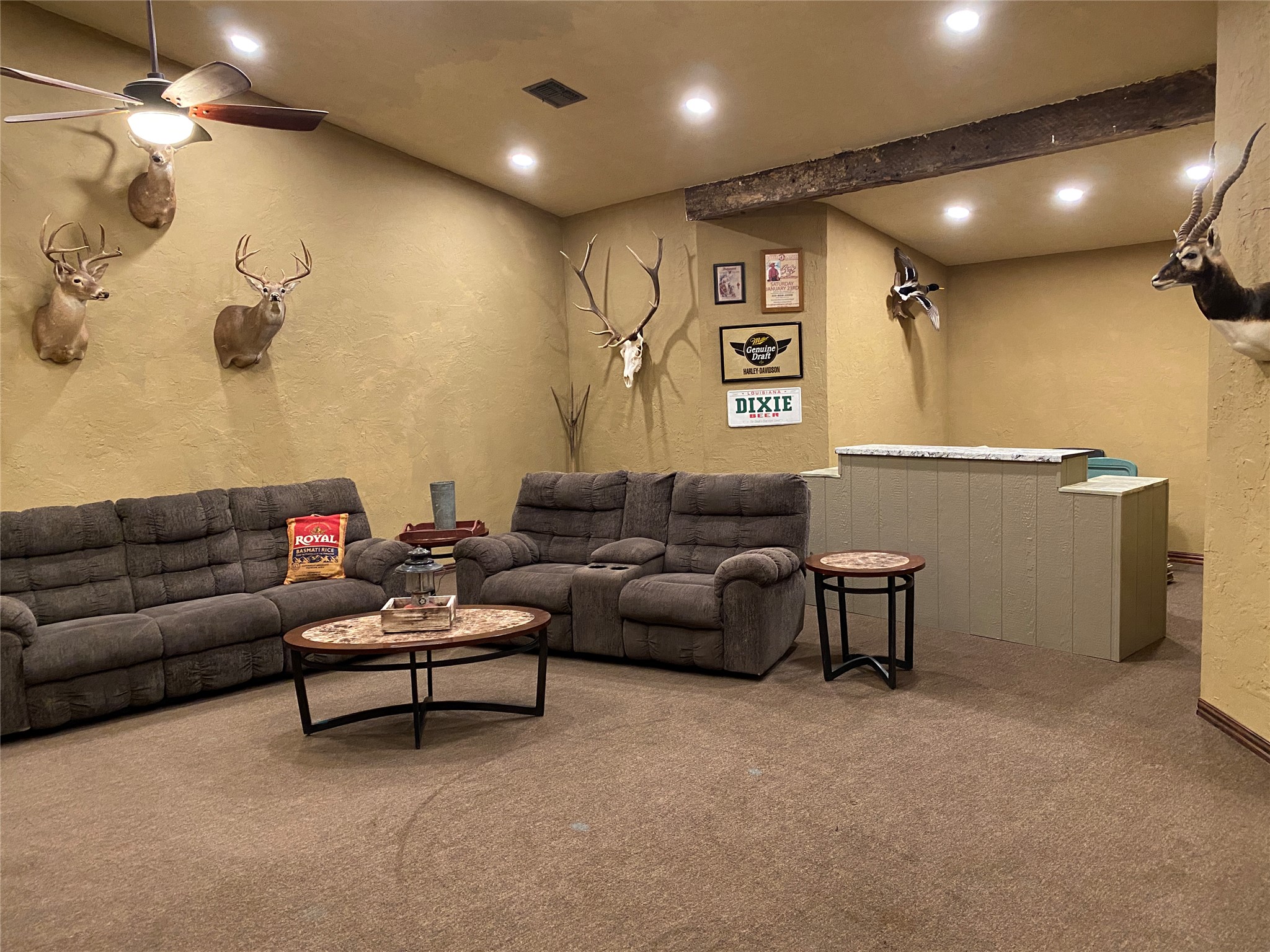 906 C R 235 Old Glory, TX 79540 - Photo 29 of 40 Carpeted living room featuring a textured wall, recessed lighting, and ceiling fan