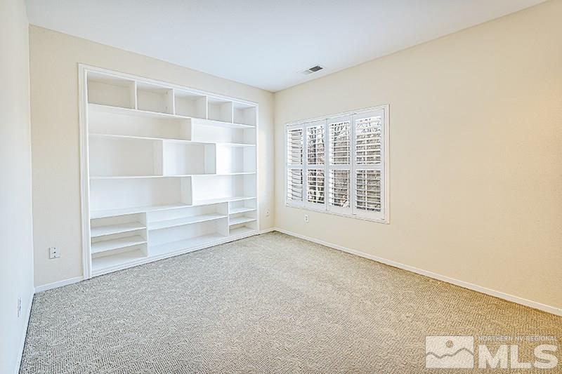 1137 Tule Drive Reno, NV 89521 - Photo 11 of 17 a view of an empty room with a window and closet
