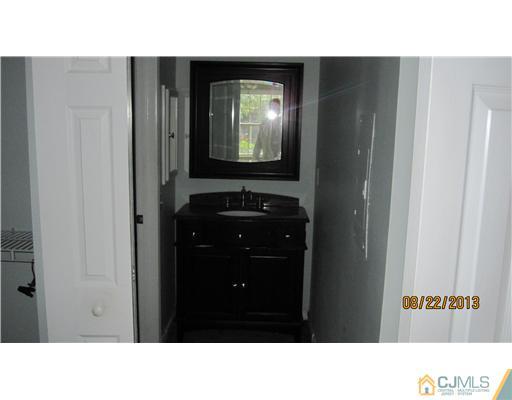 713 Edpas Road New Brunswick, NJ 08901 - Photo 8 of 16 a black and white photo of a cabinet