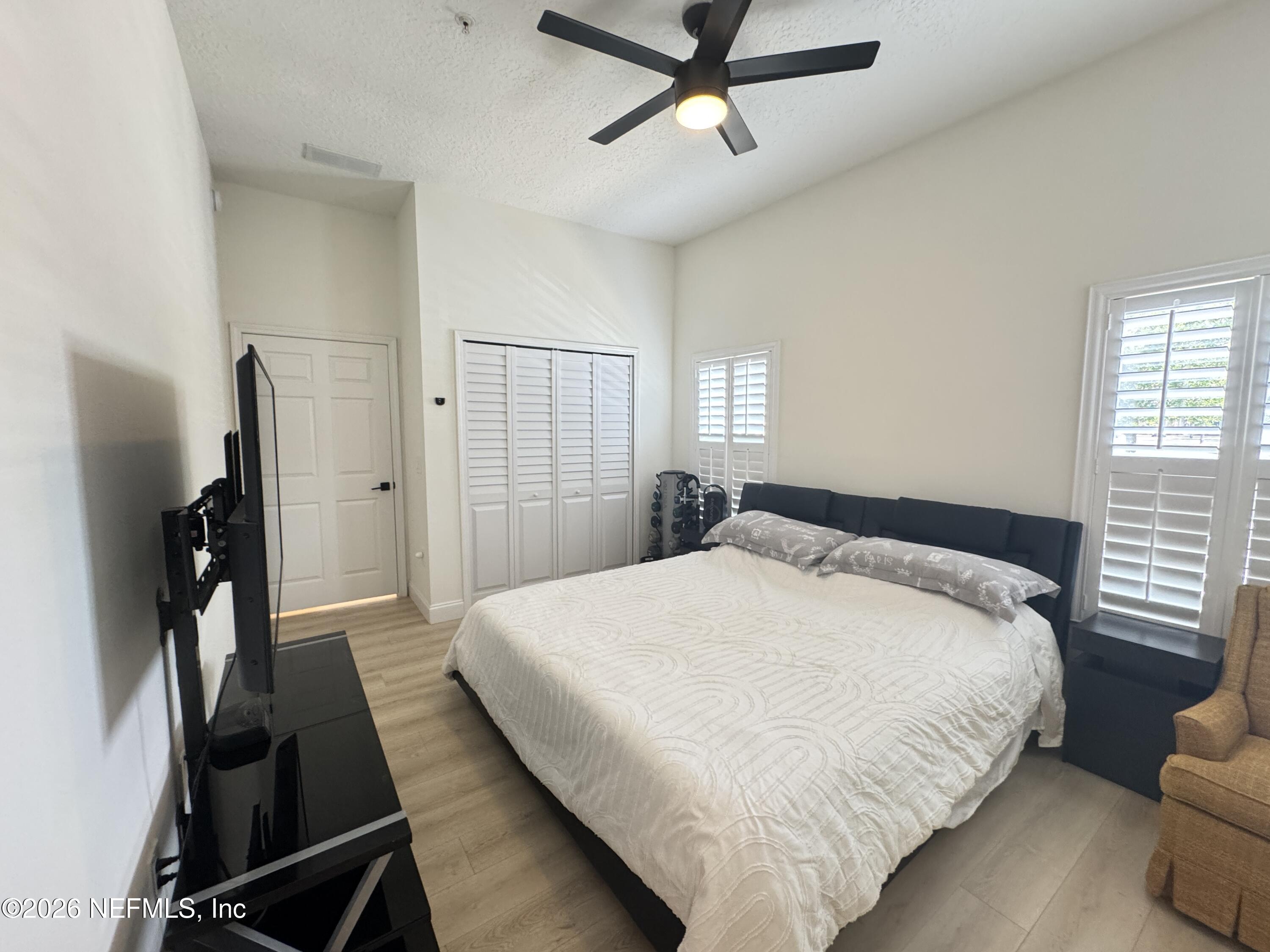 7920 Merrill Road, Unit 1205 Jacksonville, FL 32277 - Photo 14 of 25 Master Bedroom