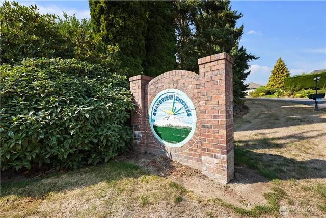 a view of a wooden house with a swimming pool