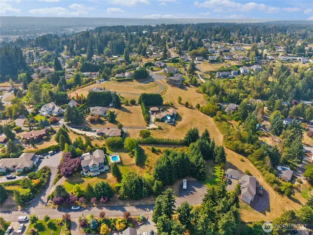 an aerial view of a city with lots of residential buildings