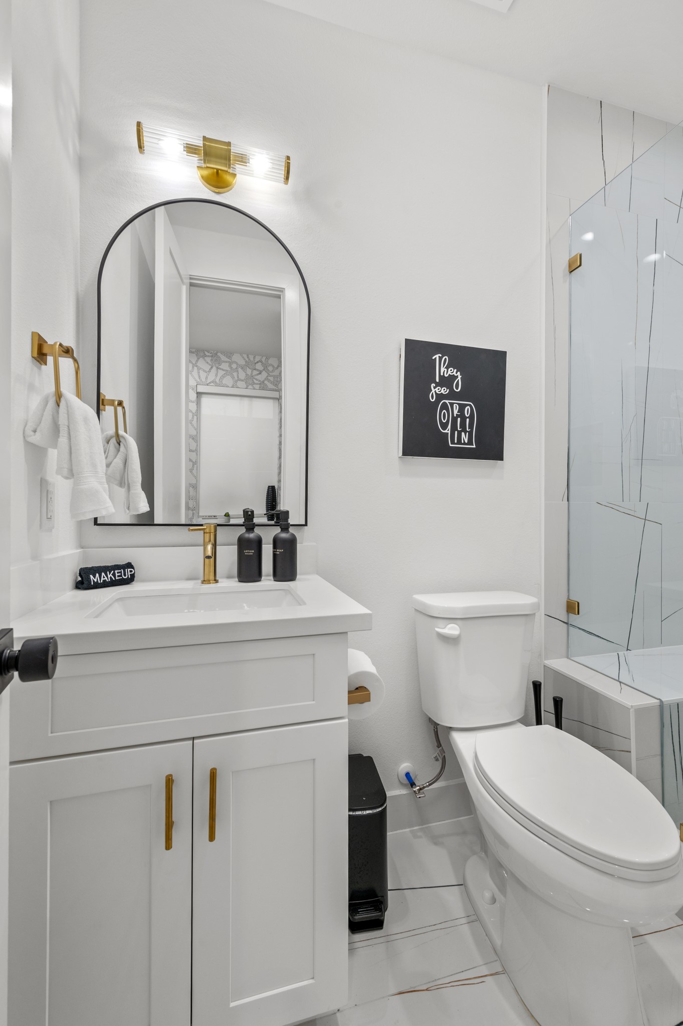 3313 Hadley Street, Unit B Houston, TX 77004 - Photo 4 of 26 a bathroom with a toilet sink and mirror