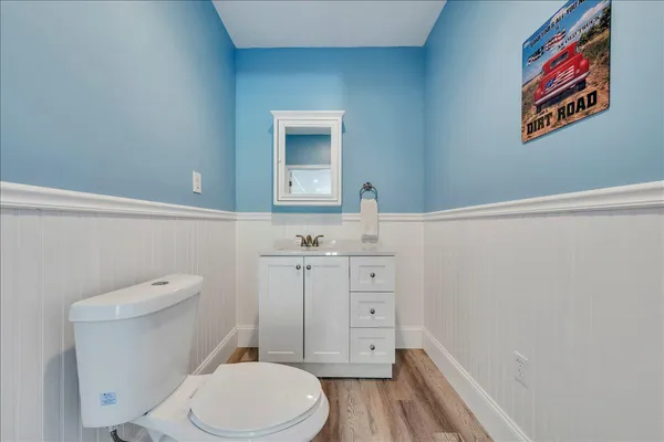 a spacious bedroom with a bed and a table